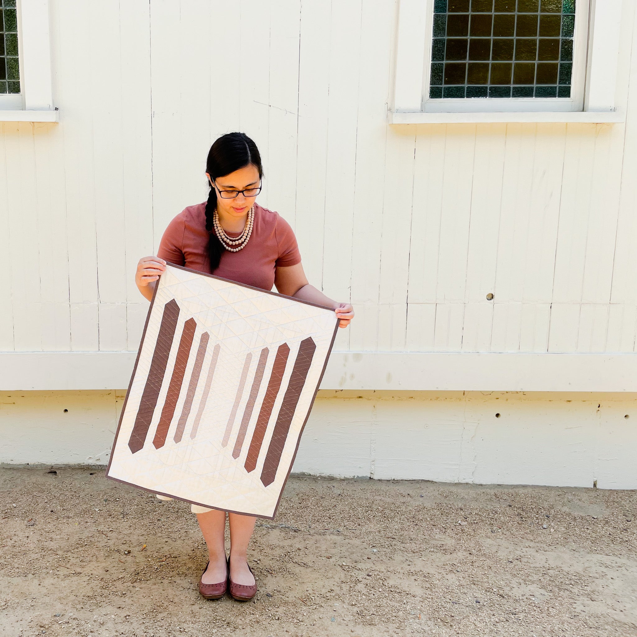 Pineknot Quilt - a modern quilt pattern with a gradient of vertical stripes